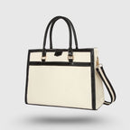 Close-up of tote bag zip pocket and metallic hardware detail